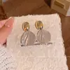 Brincos de Metal com Textura de Concha Irregular para Mulheres, de Alta Qualidade, Brincos Exagerados de Nicho, Elegantes, Modernos e Versáteis