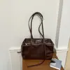 Bolso de hombro de gran capacidad para mujer, nuevo estilo transfronterizo 2026, bolso simple estilo coreano para la axila, bolso de mano para mujer