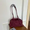 Bolsa de Bowling Feminina Estilo Casual 2026 Outono Nova Simples e Estilosa Bolsa Almofada Leve Grande Capacidade Bolsa de Ombro