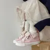 Zapatos de lona con diseño único, artículo popular primavera/otoño 2026, combinados con faldas, zapatos blancos de cordones frontales, zapatillas casuales de moda y versátiles