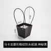 Arreglo floral cesta pequeña caja de flores de mano cesta de flores bolso de mano macaron bolsa de flores frescas bolsa de papel floristería en stock