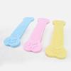 Brinquedo direto da fábrica para animais de estimação Macaron cor TPR osso plano brinquedo para cachorro ranger dentes roer osso de cachorro TPR