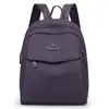 2026 Nueva Mochila para Mujer Tejido de Nylon Ligero Simple Versátil Casual Versátil Repelente al Agua Cómoda Resistente al Desgaste Mochila
