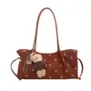 Otoño 2026 Nuevo Estilo Perezoso Lunares Diseño Nicho Moda Gran Capacidad Simple Elegante Versátil Bolso de Hombro Simple