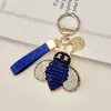 Llavero de metal con forma de abeja de aleación y pedrería, el más vendido transfronterizo, un accesorio popular y exquisito para bolsos