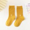 Calcetines para niños primavera nuevos calcetines de tubo para niños y niñas cómodos pies sin olor bordados color liso calcetines deportivos