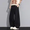 Jeans preto retro americano com barra curva para homens e mulheres, novo estilo de primavera, design high street, corte solto, modelador, perna larga fluido
