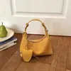Bolso de mano pequeño para mujer para salir, tendencia de moda verano 2026, bolso de hombro de alta gama, bolso cruzado tipo albóndiga para el día a día