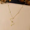 Gafas de sol estilo europeo y americano de estrella y luna con colgante de diamante, cadena en Y con borla, collar de acero inoxidable bañado en oro de lujo ligero para clavícula para mujer