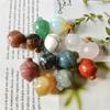 Atacado Cristal Natural Esculpido Pinha Fruta Avelã Bolota Mini Pequenas Decorações Pingente Cristal Transfronteiriço Venda Quente