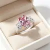 Transmissão ao Vivo da Europa Venda Quente Corte Radiante Pedra Rosa Pedra Principal com Anel de Diamante Branco Anel Feminino de Pedra Colorida de Alto Padrão