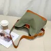 Bolso de Hombro Versátil de Empalme Retro Europeo y Americano para Viajes Diarios Gran Capacidad Correa Ancha para Mujer Puede Caber Libro A4 Fabricante de Bolsos de Hombro Stock Listo