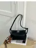 Bolso de mano de comercio exterior transfronterizo de la fábrica de origen, bolso de pinza vintage de lujo ligero, bolso de hombro ligero