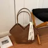 Bolsa de Axila Versátil Retrô Transfronteiriça Feminina Nova Moda Outono 2026 Casual Bolsa de Ombro Único Bloqueio de Cor Bolsa Tote para o Dia a Dia