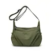 Nueva bolsa de hombro de nailon impermeable con múltiples compartimentos, simple y versátil para el trabajo, de comercio exterior transfronterizo para mujer.