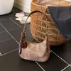 Nova Bolsa de Axila Outono 2025 Estilo Coreano Feminina Bolsa de Ombro de Nicho Bolsa Transversal Estilo Ocidental Bolsa de Ombro Casual para o Trabalho