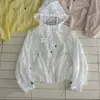 Chaqueta Protectora Solar 2026 Primavera y Verano Nueva Popular Estilo Coreano Chaqueta Protectora Solar con Capucha de Encaje para Mujer Holgada Delgada con Cordón Ropa Exterior