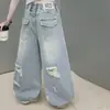Conjunto de Verano para Niñas Estilo 2026 Casual Estilo Coreano Top de Canalé de Manga Corta con Etiqueta Blanca y Pantalones de Mezclilla Rasgados para Niños Mayores