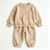 Conjunto de moletom infantil liso para meninos e meninas, conjunto de duas peças com calça de moletom soltinha com punhos, roupas infantis de outono, fornecimento transfronteiriço