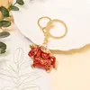 Pequeño Regalo de Año Nuevo Estilo Chino Caballo que Trae Fortuna Llavero con Corazón de Metal Perlado y Cordón de Cuero Colgante para Llave
