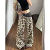 Jeans rotos de leopardo retro americano para mujer, nuevo estilo de verano 2026, pantalones holgados de doble cintura de pierna ancha hasta el suelo