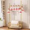 Perchero de pie de lujo ligero personalizado para dormitorio, perchero de metal con ruedas y cesto para ropa sucia, estante de almacenamiento de pie para uso doméstico
