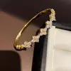 Pulsera vintage estilo palacio con cierre de corazón de circonita chapada en oro real de 18 quilates, joyería de moda exquisita transfronteriza europea y americana