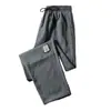Pantalones Casuales Delgados de Lino Hielo de Seda Nuevos de Verano para Hombre Rectos Sueltos Talla Grande Deportivos Acortados