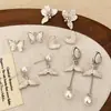 Elegante temperamento dulce temperamento alto sentido cristal rosa mariposa amor pendientes moda lujo perla borla pendientes