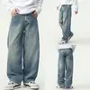 Jeans lavados de color claro estilo americano con corte curvo para hombre, nueva marca de moda otoño 2026, pantalones largos holgados de retazos multibolsillos