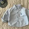 Otoño Primavera 2026 Nueva Camisa Chaqueta para Niños Niñas Bordado Bebé Casual Versátil Moda Elegante Top