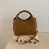 Bolsas Casuais Exclusivas de Nicho para Mulheres 2025 Inverno Nova Moda Bolsa Transversal com Corrente Bolsa de Mão de Alto Valor Bolsa Tote Pequena