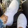 Zapatillas talla grande mujer 2021 primavera nuevo suela gruesa color liso con cordones tejido volador de un paso zapatos de papá wish transfronterizo