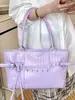 Bolso tote de color liso de gran capacidad estilo coreano para mujer, nuevo bolso de hombro para moto de verano 2026, simple y elegante
