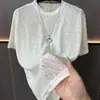 Nueva Camiseta de Manga Corta para Hombre de Malla Transpirable de Alta Calidad Color Sólido Delgada, Ajuste Holgado, Cuello Redondo, Versátil de Media Manga, Verano 2026