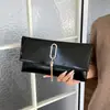 Bolsa de almacenamiento de moda transfronteriza 2026 bolsa de maquillaje portátil bolso de mano de lujo de alto valor bolsa para teléfono brillante moderna