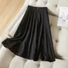 Traje falda de lunares de estilo suave y temperamento para mujer verano 2026 Top francés sin mangas con falda midi ajustada conjunto de dos piezas de lujo ligero