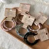 Paquete de 3 Gomas para el Cabello de Bambú Estilo Nuevo 2025 Banda Elástica Coleta Alta Elasticidad y Duradera Diadema Accesorios para el Cabello para Mujeres