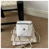 Bolso mini cuadrado nuevo y moderno, versátil, bolso bandolera estilo Chanel con patrón de diamantes y cadena, bolso de mano de alta gama para mujer