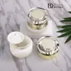 Cosméticos de alto valor de cor Conjunto Xinyue frasco 30g frasco de creme 100ml creme aquoso essência de creme frasco de vidro fundo grosso