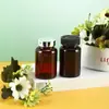 Botella de plástico PET de 200 ml botella para productos de cuidado de la salud botella para pastillas de protección hepática plástico engrosado multicolor botella para el cuidado de la salud fábrica venta al por mayor