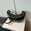 Bolso de nicho transfronterizo para mujer 2026, bolso versátil de hombro y cruzado, bolso de cuerno moderno y súper popular, bolso nuevo y moderno ligero