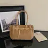 Bolso tote de hombro cruzado europeo y americano 2026 gamuza retro gran capacidad mate para mujer