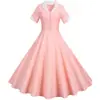 Comercio exterior transfronterizo estilo Hepburn retro europeo y americano verano nuevo traje de manga corta con cuello de solapa vestido casual de color liso acampanado