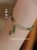 Nueva pulsera de bambú oliva estilo chino diseño nicho retro pulsera con colgante de campana retro alto sentido pulsera para novias