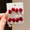 Aretes de Poni Asimétricos con Lentejuelas de Imitación Perla Goteo de Aceite y Moño Afelpado Aguja de Plata Otoño e Invierno Retro Nicho Aretes de Alta Gama