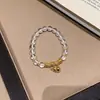 Pulsera de Cordón Dorado con Calabaza de Cristal Blanco Transparente para Mujer, Nicho de Alta Gama Lujo Ligero Personalidad Versátil Temperamento Nueva Joyería