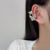 Pendientes de mariposa de diseño nicho de lujo ligero para mujer, ear cuff nuevo único y hermoso 2026, joyería para orejas de aspecto súper bueno y sensación de alta gama