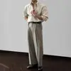 Camisa de manga larga coreana para hombre de primavera y otoño, camisa de negocios moderna con textura de raya vertical, color liso, casual y holgada, top sin arrugas
