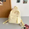 Mochila pequeña de alto valor, casi de corazón de niña dulce, estilo japonés INS, linda, pequeña, fresca, mochila de viaje para niños